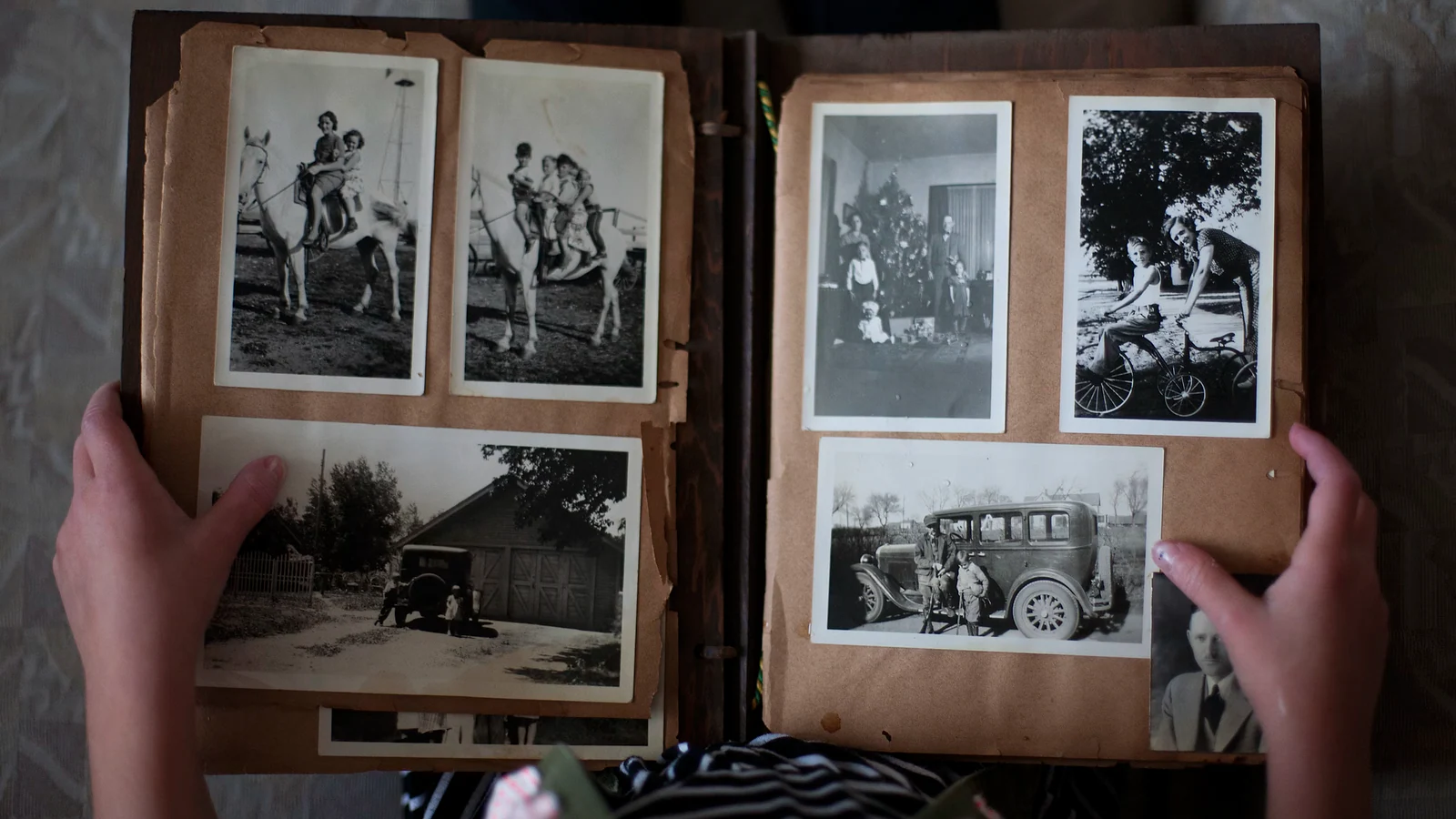 Vintage photo album opened for restoration